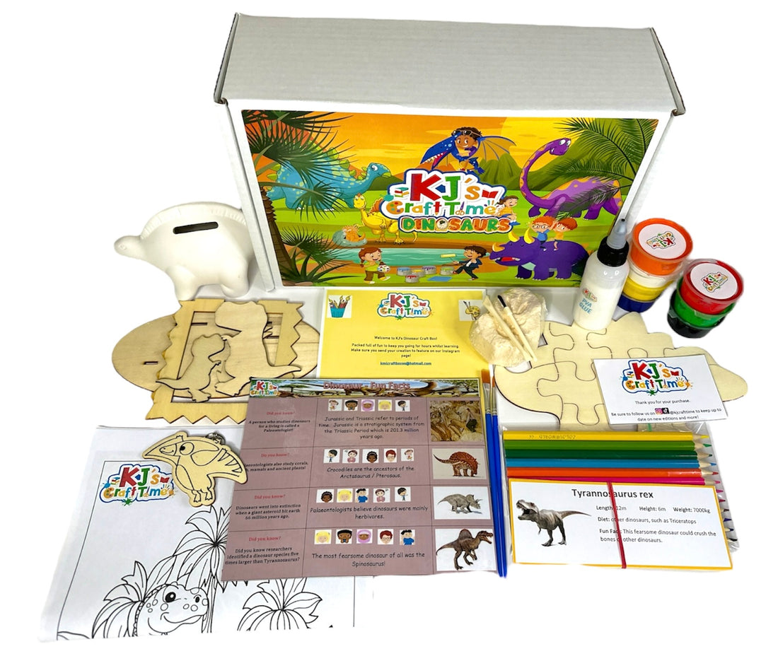 Front view of the Dinosaur Craft Box for kids with all included materials such as ceramic coin box, wooden puzzle, and activity sheets displayed.