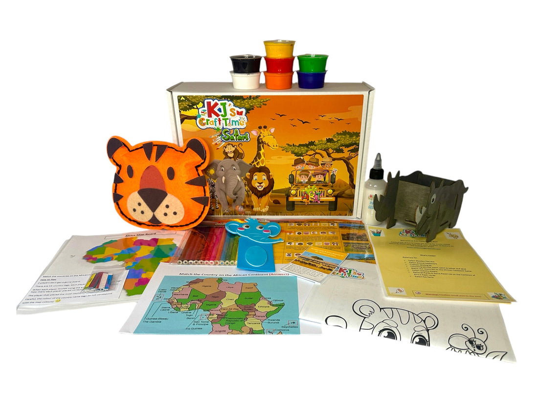 Front view of Safari Craft Box with all materials, including paints, safari pen pot, animal bookmark, sewing kit, and game activities laid out around the box.