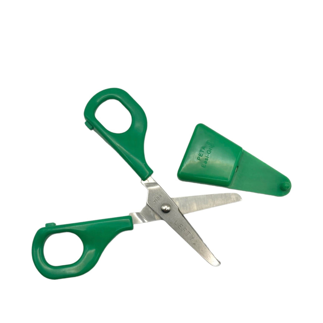 Green and blue Child Self-Opening Scissors, both open with blade guards placed beside them, designed for children with special needs.