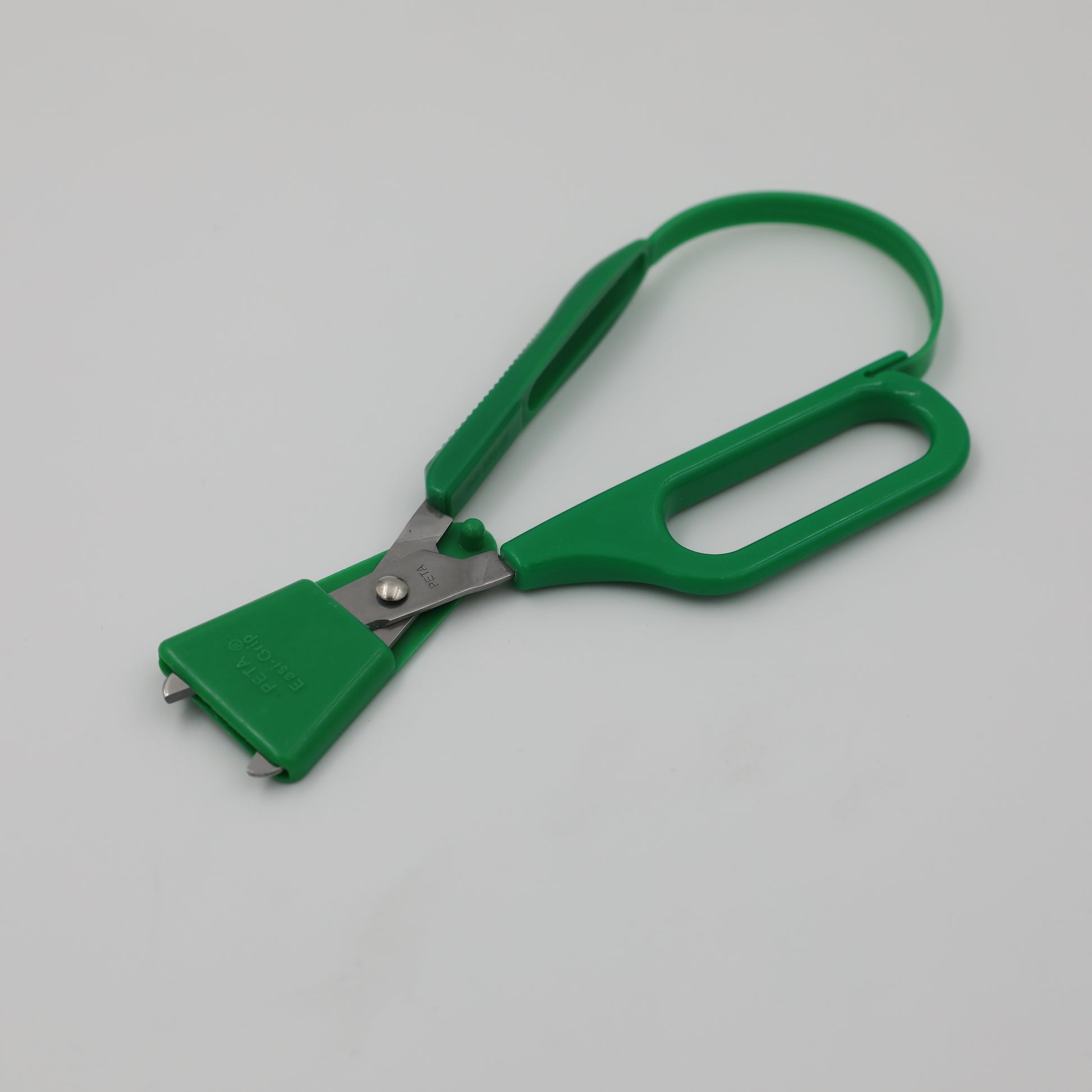Green left-handed Long Loop Easi-Grip Scissors with blade guard for safety when not in use.