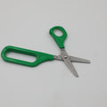 Left-handed Long Loop Self-Opening Scissors with green handle, featuring a discreet spring for easier cutting.