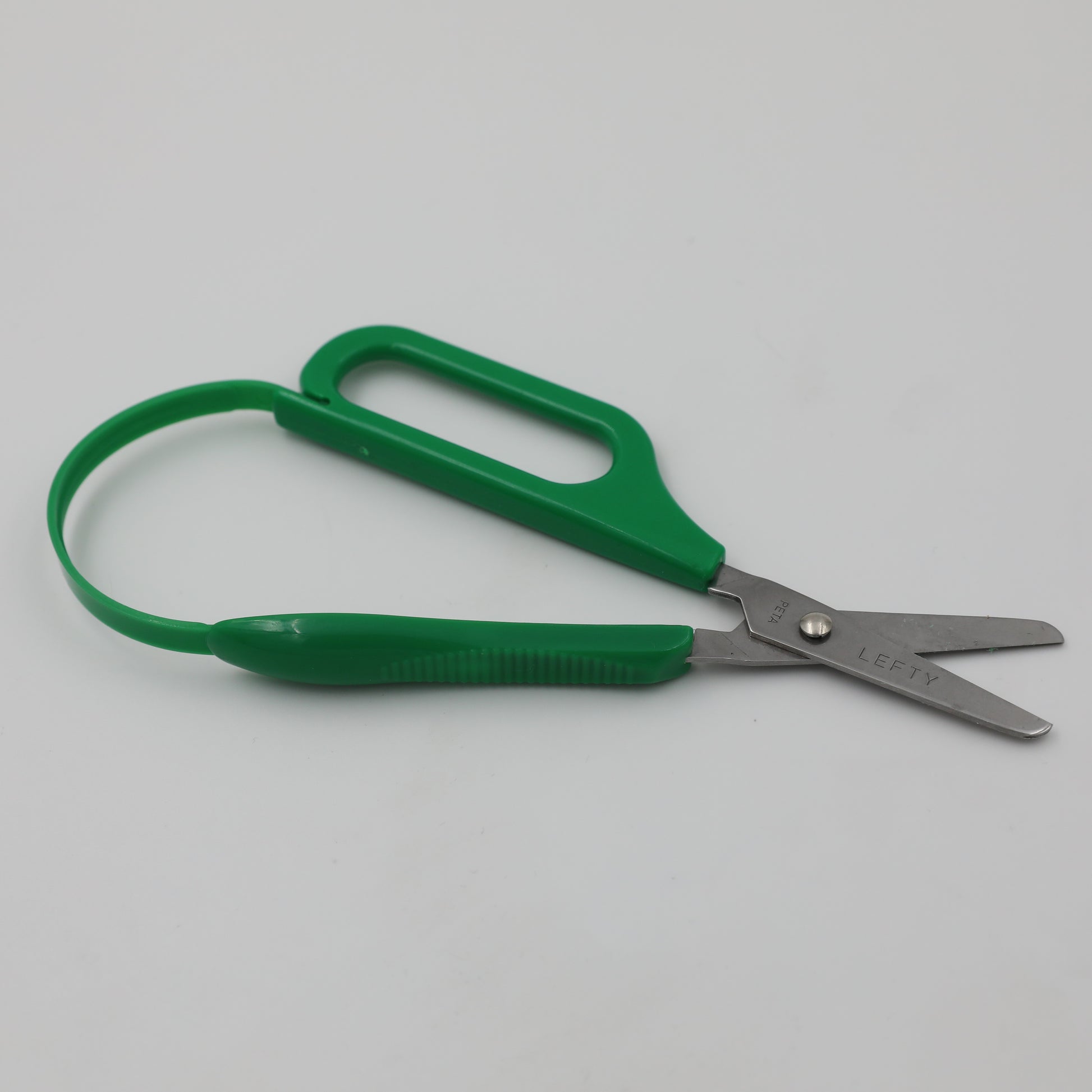 Green left-handed Long Loop Easi-Grip Scissors with a long loop handle for extra stabilisation, designed for weak hands.