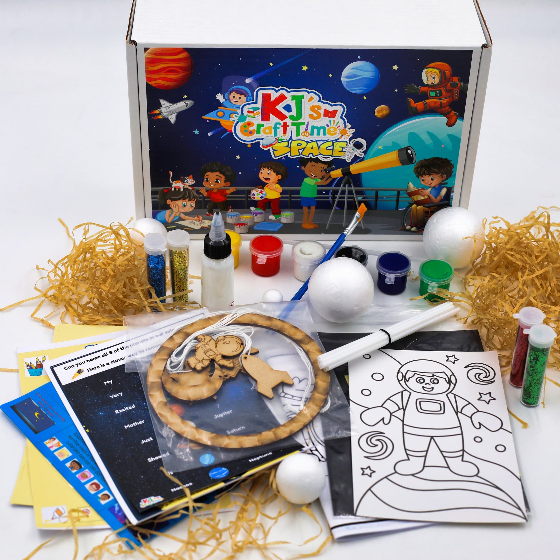 Complete Space Craft Kit for kids displayed with the craft box and all included materials for screen-free creative learning.