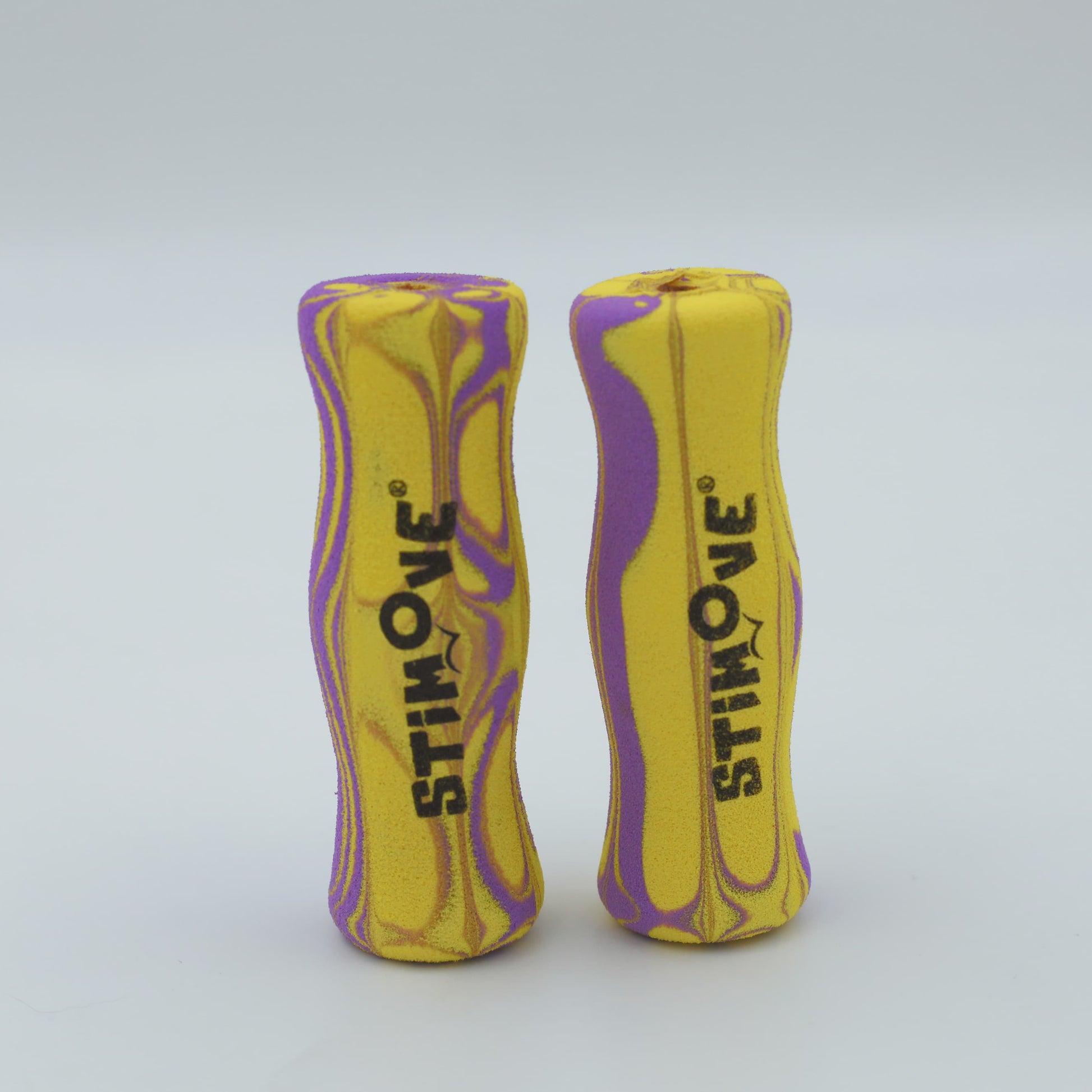 Abilitations Abiligrip foam grip standing upright, highlighting its cylindrical shape and lightweight foam material.