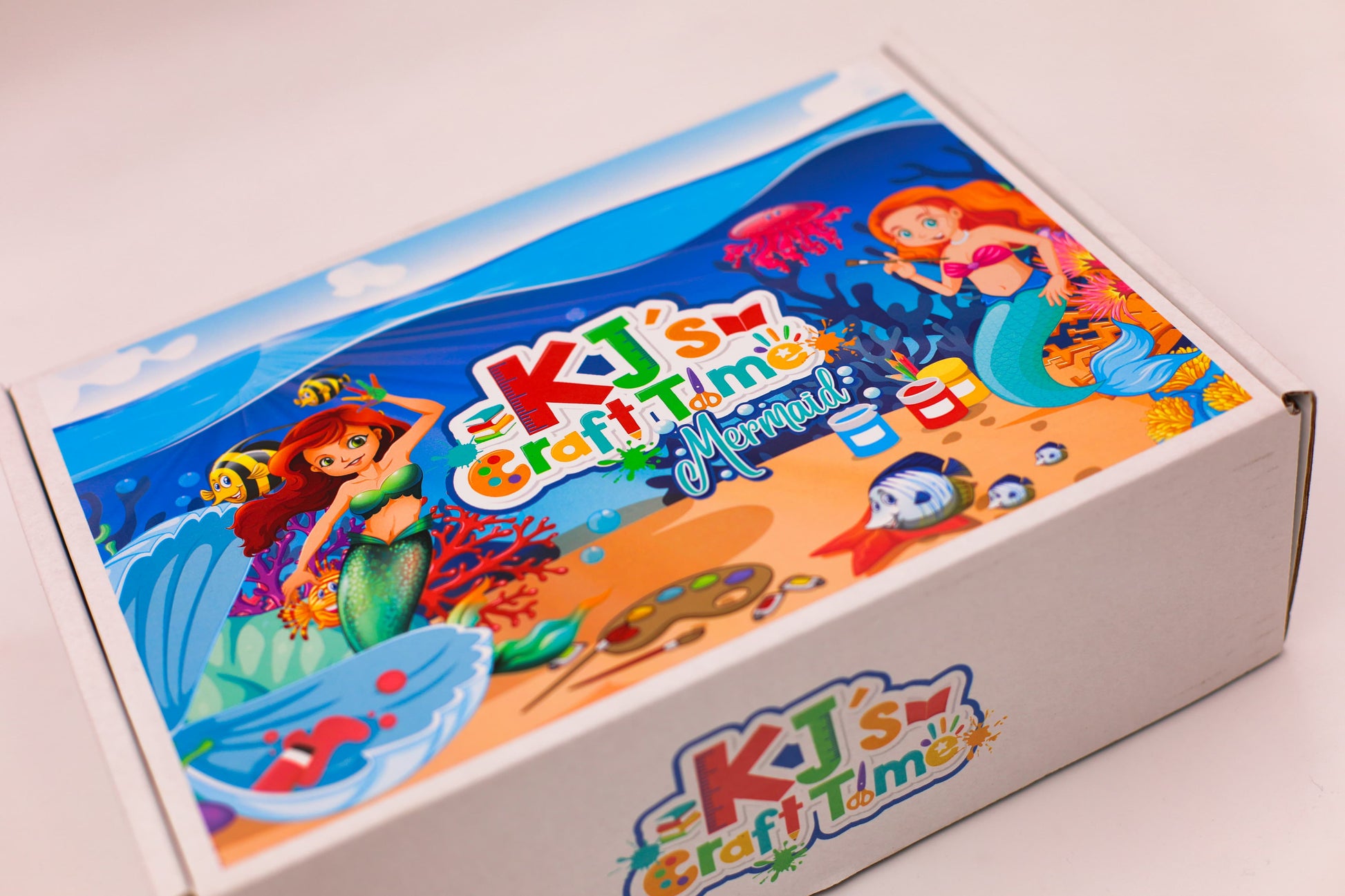 Close-up of Mermaid Craft Box lid showing colourful underwater mermaid illustration, ideal for a creative arts and crafts kit for kids.