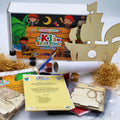 Pirate craft kit contents including wooden pirate ship birdhouse, telescope craft, paints, glue, activity sheets and more creative materials for kids.