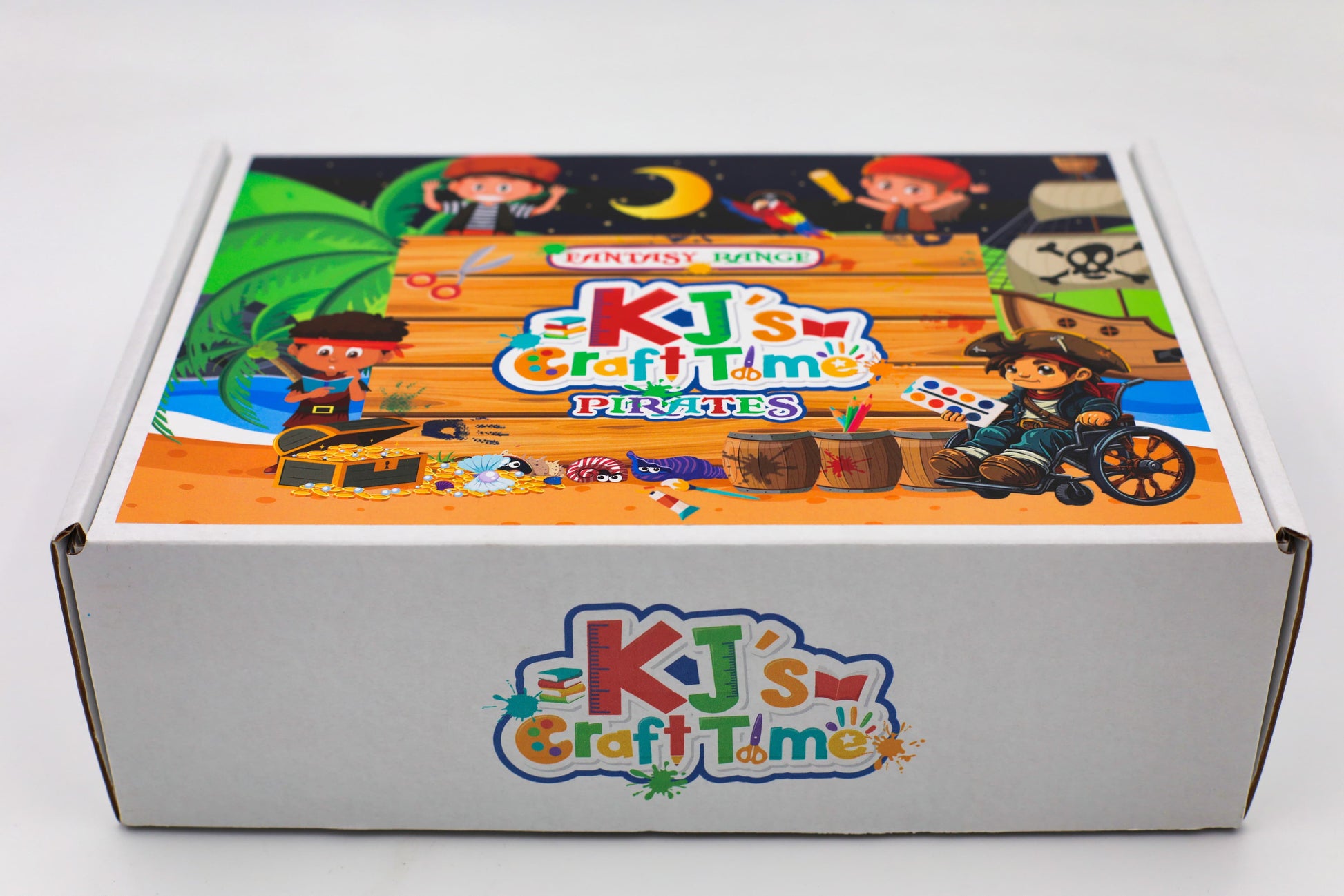 Close-up of Pirate Craft Box lid showing pirate characters, treasure, ship and adventure theme, a fun arts and crafts kit for kids.