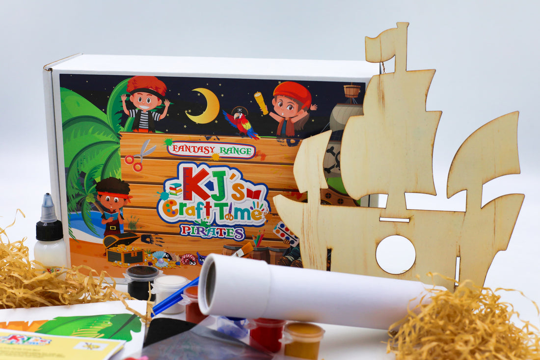 Pirate craft kit contents including wooden pirate ship birdhouse, telescope craft, paints, glue, activity sheets and more creative materials for kids.