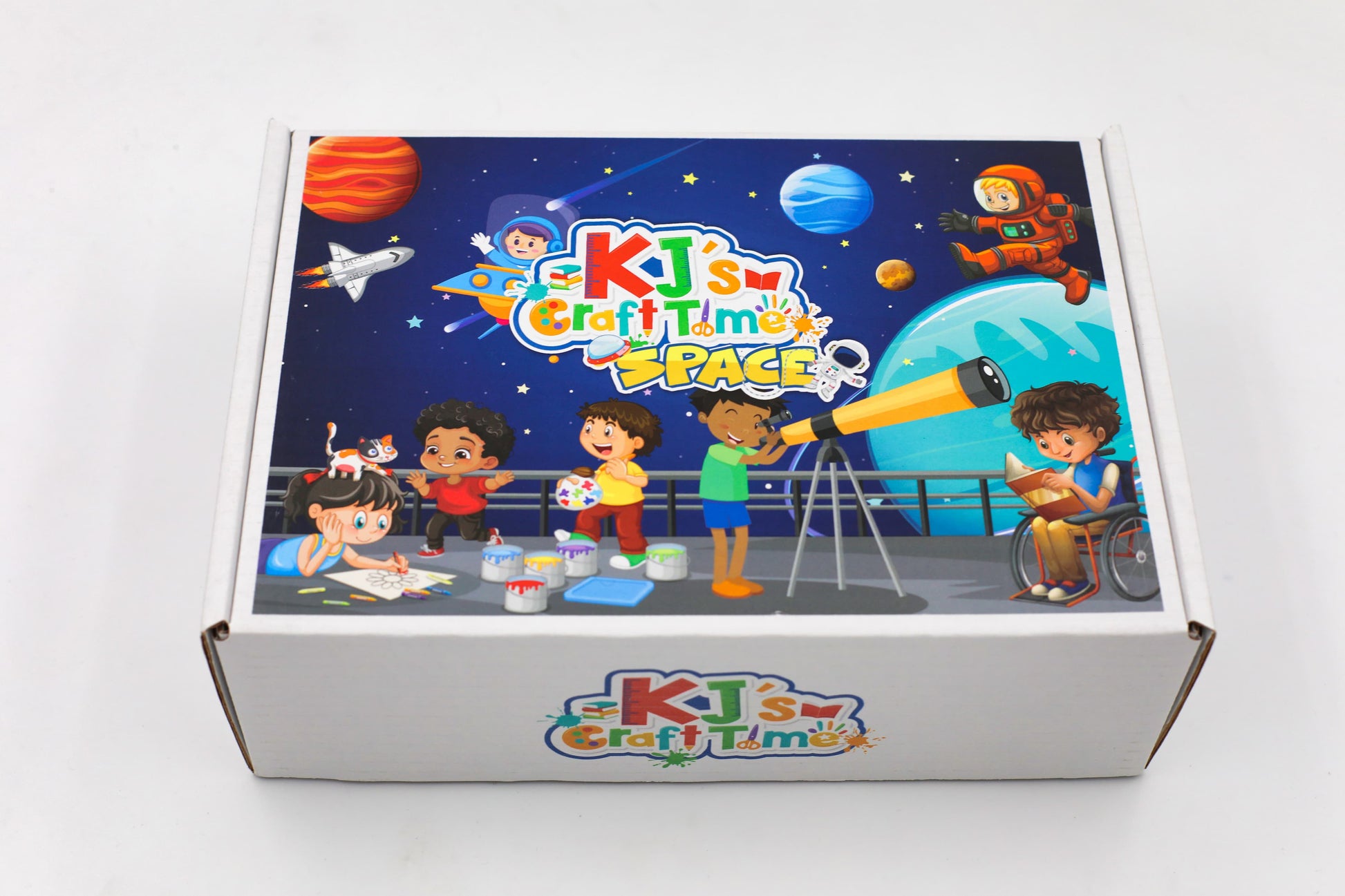 Close-up of Space craft kit box artwork featuring children exploring planets and creative space activities.